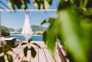 Destination Wedding Photographer photo of a wedding dress by the sea